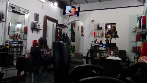 Rizos & Lisos Salon Spa